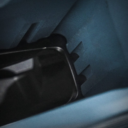 SPACE FOR OPTIONAL DOWELS FOR TIGHTER MAGAZINE FIT